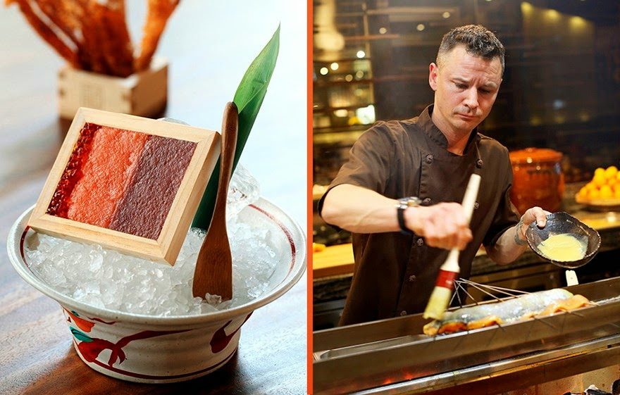 A chef brushing glaze over skewers at the robata grill
